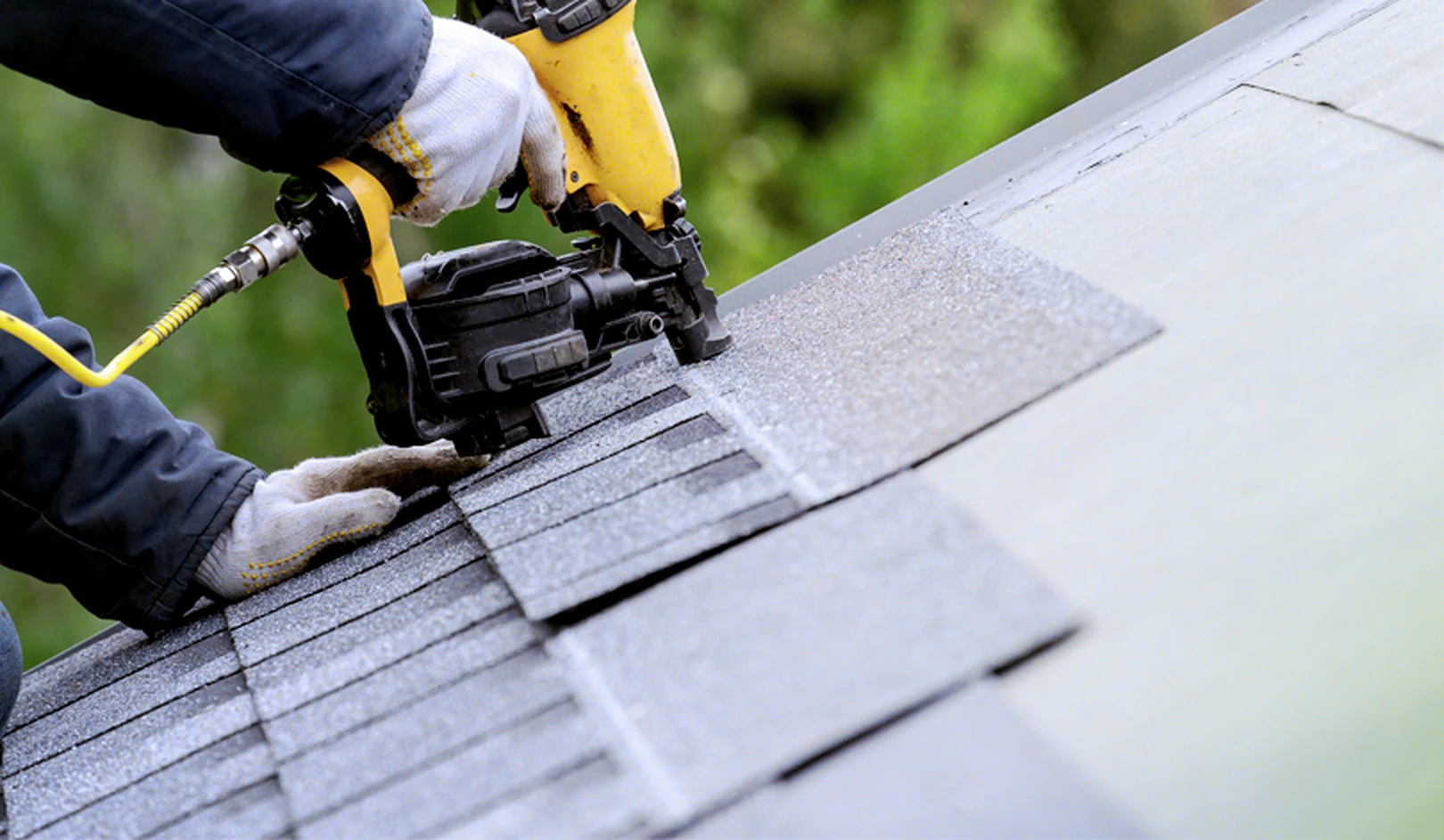 Skilled Cedarline Roofing team performing expert roof replacement on a Midland, TX home, ensuring top quality and durability, Residential Roofing in Odessa - TX as a crew replaces worn shingles on a family home