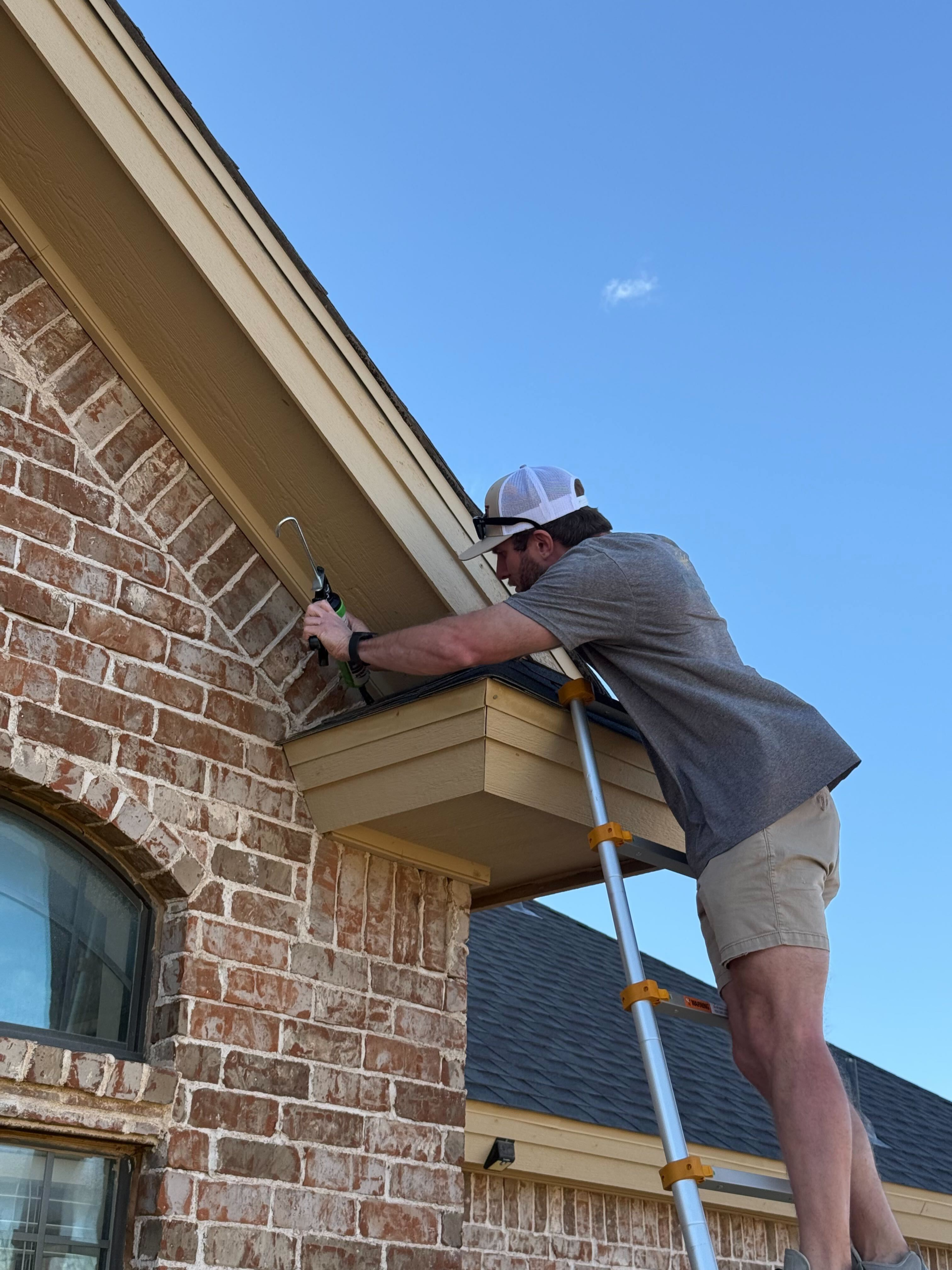 New shingle roof being installed on a single-story Texas home