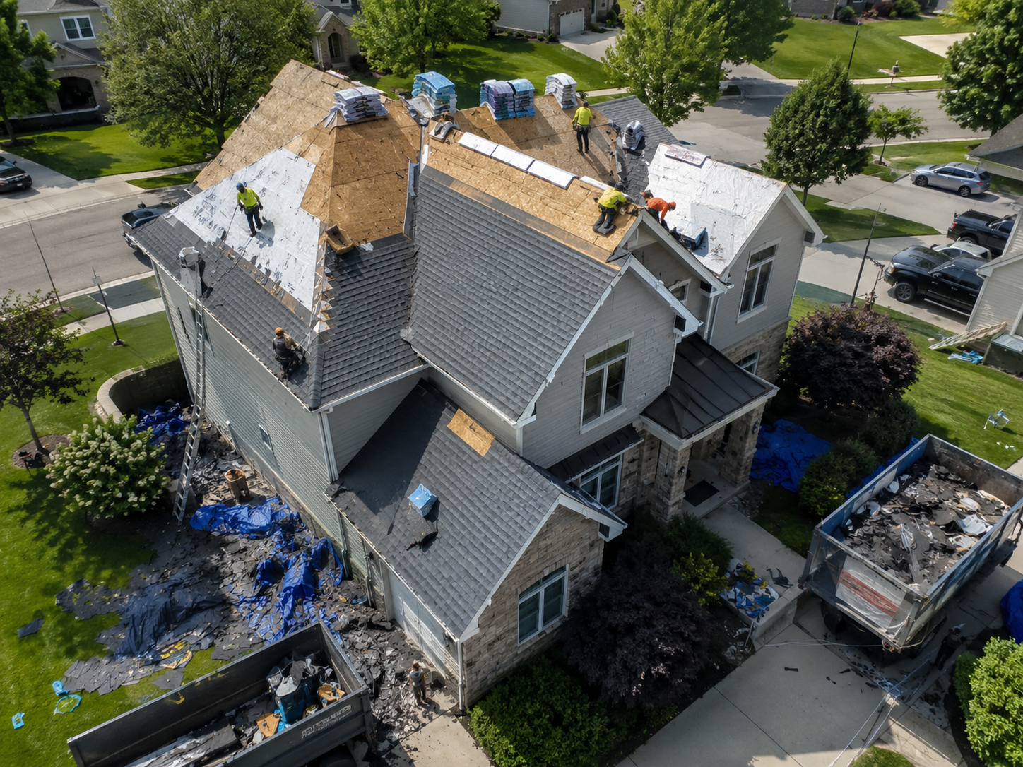 Roof inspector examining flashing and decking condition before full replacement work